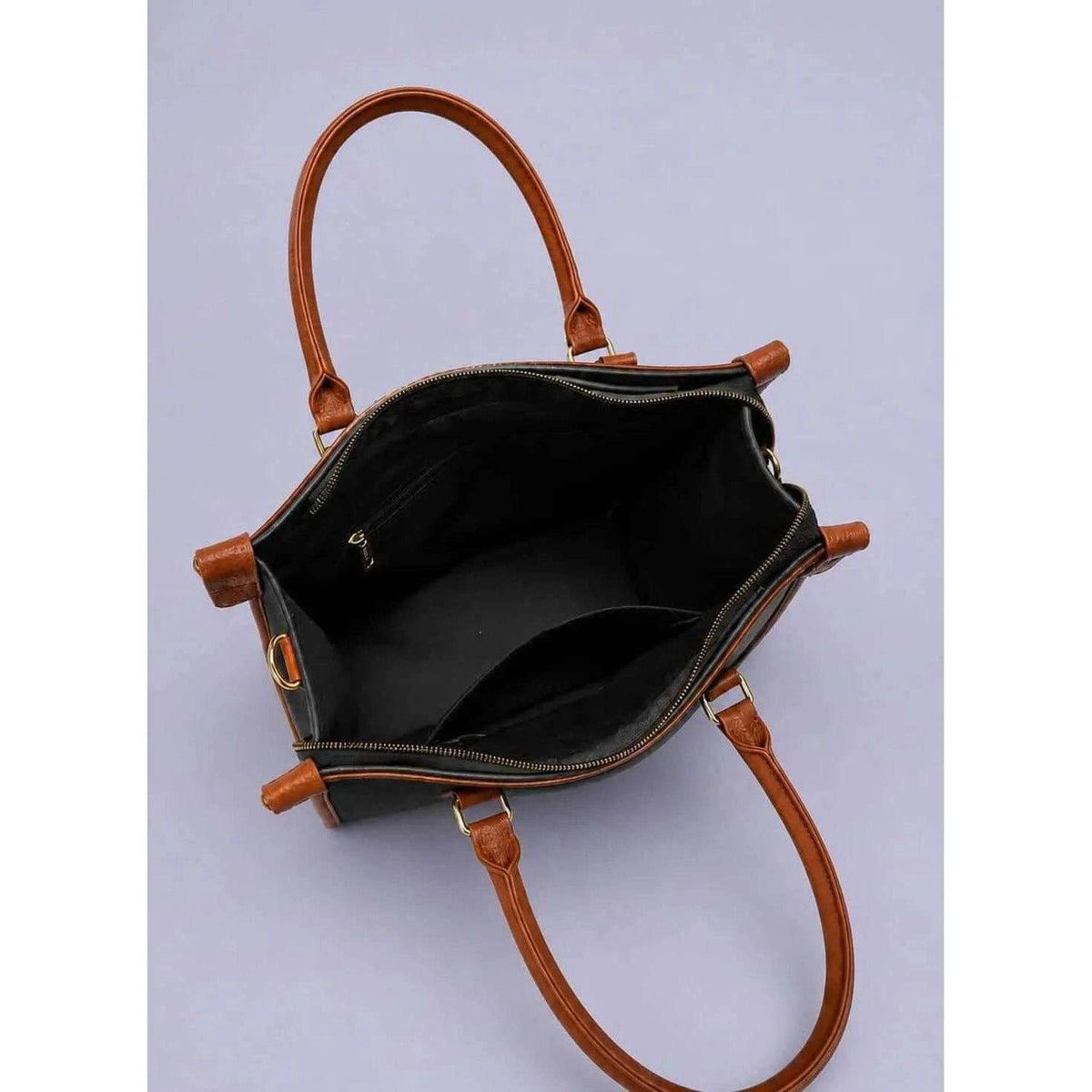 Inside storage space of classic black handbags