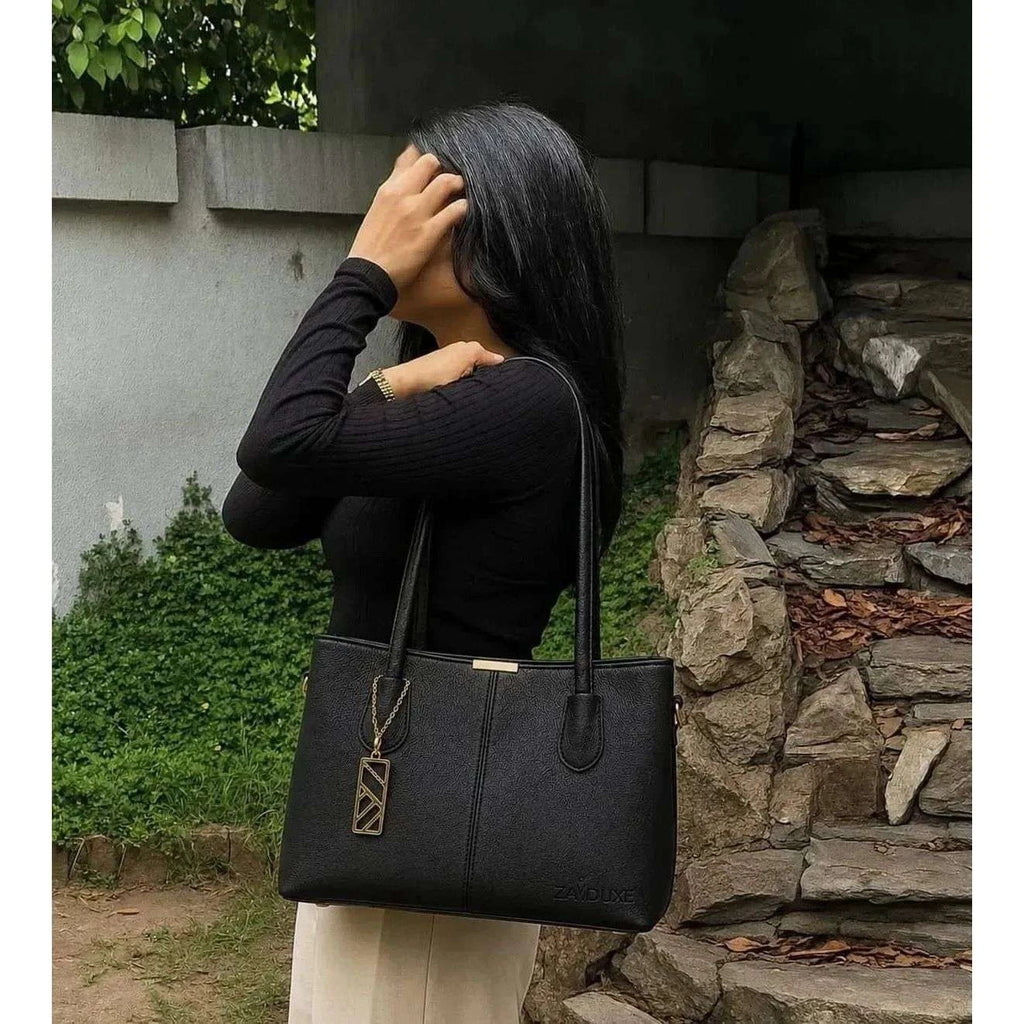  Model holding Everyday Elegance Black shoulder bag by Zaiduxe